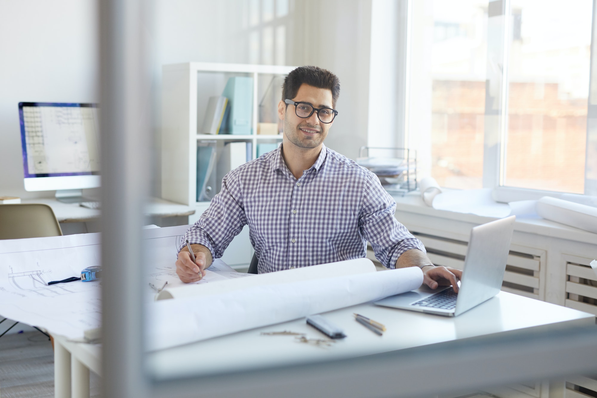 Smiling Engineer at Workplace